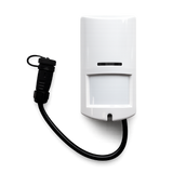 White motion sensor alarm with black cord on a white background